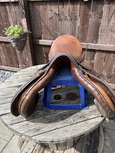 Brown leather pony - leather,