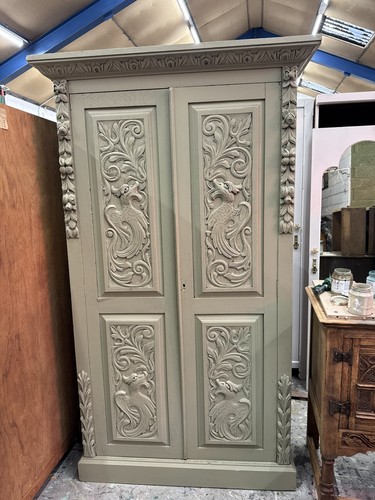 Heavily carved painted green - heavily,