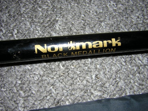 Nor mark black medallion - nor, &
