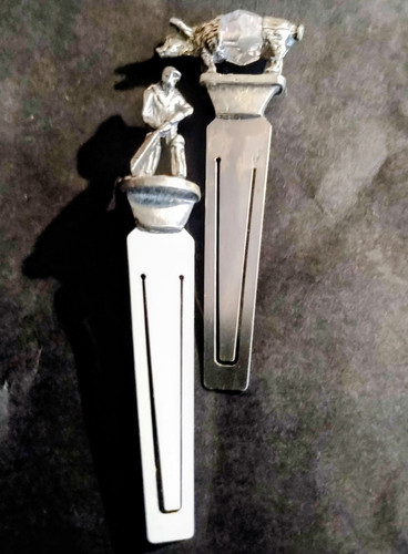 Silver tone metal figural - metal,