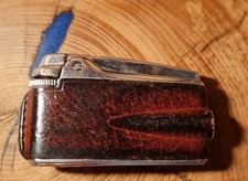 Ronson Varaflame Gas Lighter Vintage Leather Clad ,stunning Patina See Video .