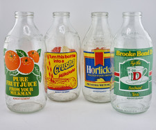 4 Vintage Unigate Milk Bottles