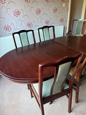 Stag Dinning Table And Chairs