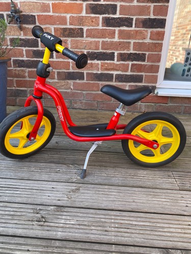 Puky child red balance bike - child's,