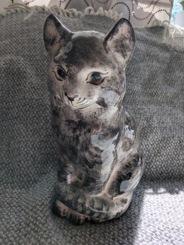 Ceramic cat the style of - the,