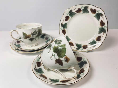 Two tea cups - two, saucers