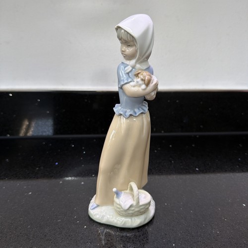 Nao lladro figurine - by,