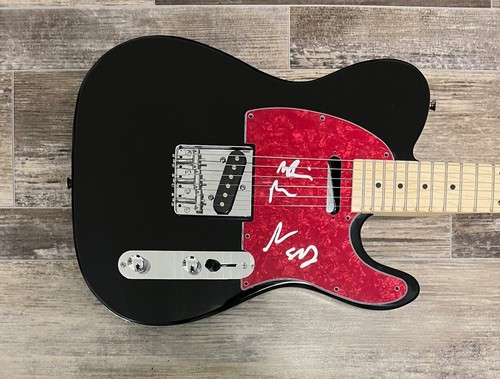 The national signed guitar - *,