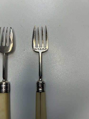 Pair antique silver - a,