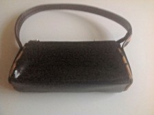 Small black faux leather and animal print trim handbag bag