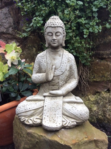 Stone garden buddha meditating - stone,
