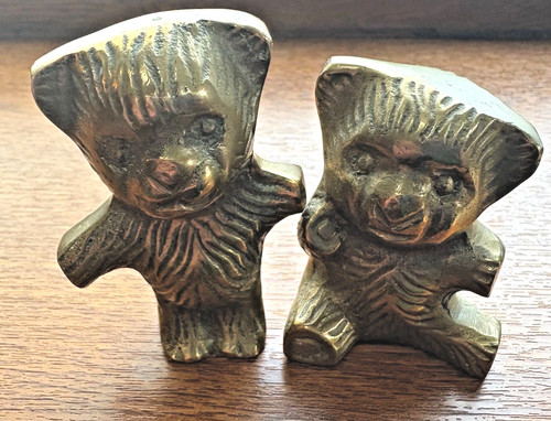 Brass coloured bear figurines - bear,