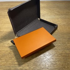 SECRID men's orange metal card holder RFID