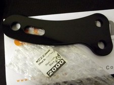 Front number plate offset