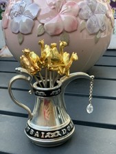 Arabic coffee pot (dallah) with a set with gilded camel figures 