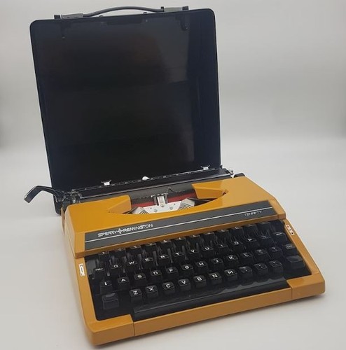 Vintage 80s yellow typewriter - vintage,