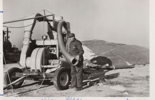 1950s man grain - dryer, blower