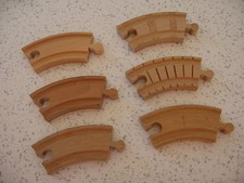 SET OF SIX SMALL CURVED PIECES
