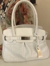 #10.  Jasper J Conran White