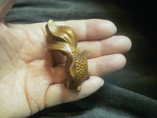 Hand Carved wood netsuke of a
