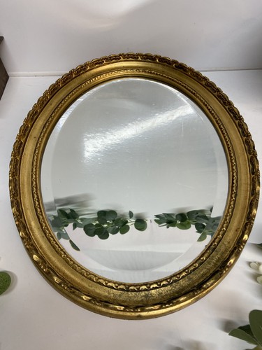Gilt oval bevelled edge mirror