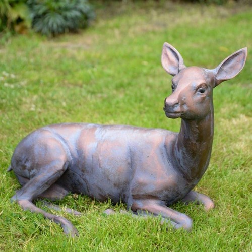 Bronze laying doe sculpture - laying,
