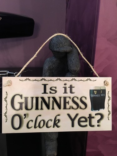 Guinness clock yet man - is,