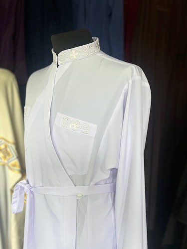 White cassock made - , of