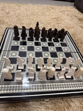Bring elegance and history to your home with this handmade stone chess set.  Eac