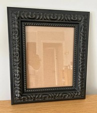 Ornate black or gold picture