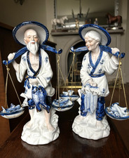 Pair Vintage Leonardo Collection figures, man and woman market sellers 10" tall