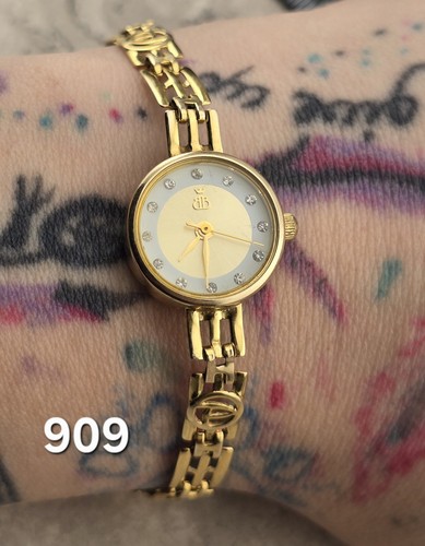 9ct yellow gold brooks - 11.1g,