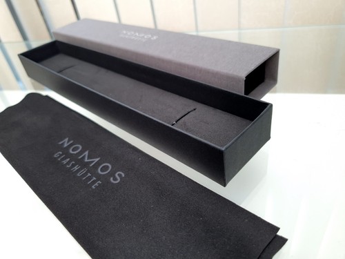 100 genuine nomos - genuine, box