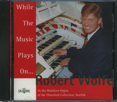 Robert wolfe while the - wolfe, music