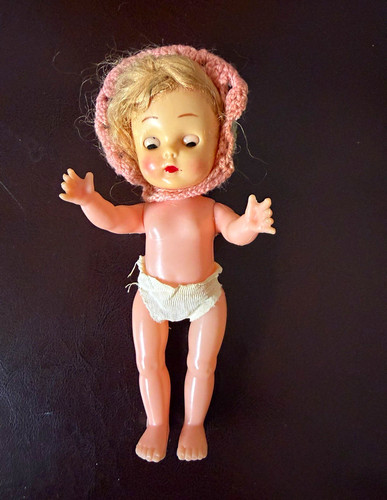 Plastic doll with - , jointed