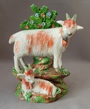 STAFFORDSHIRE PEALWARE FIGURE OF A GOAT WITH A KID C1815-25