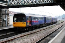 PHOTO  CLASS 142 UNIT 142063 AT EXETER STATION 1010