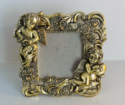 Ornate gold cherub - angel, photo