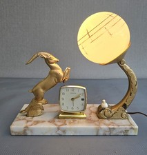 Art Deco French light with a goat, clock & frosted glass globe on a marble base