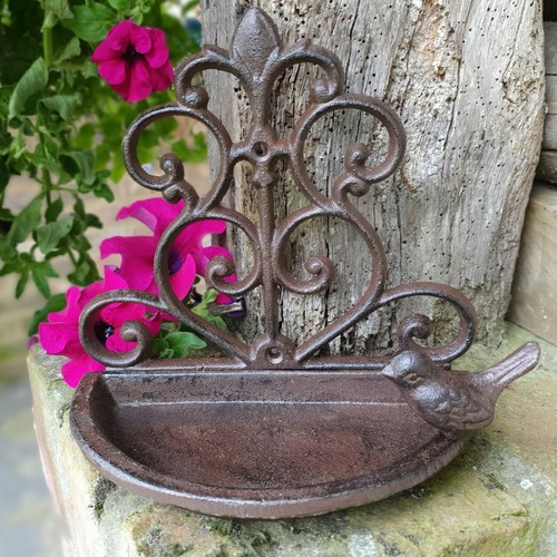 Ornate scroll cast - iron, wall