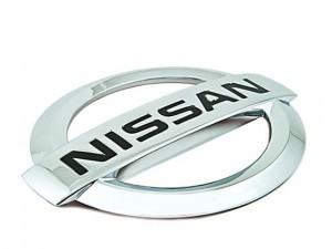 Nissan genuine front emblem - front,