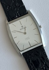 Genst Titan Edge Super Slim 29mm Silver Tone 1044SBB Brand New Battery