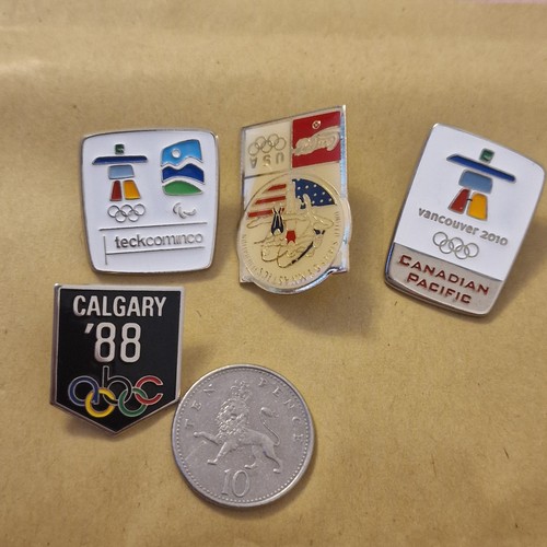 Olympics badges - olympics,