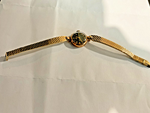 Omega 9ct gold - omega, black