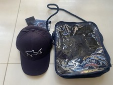 Paul and Shark signature hat in navy blue and gift bag/carry bag