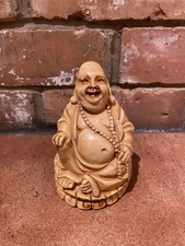 Vintage seated Laughing Buddha statue solid and made of resin