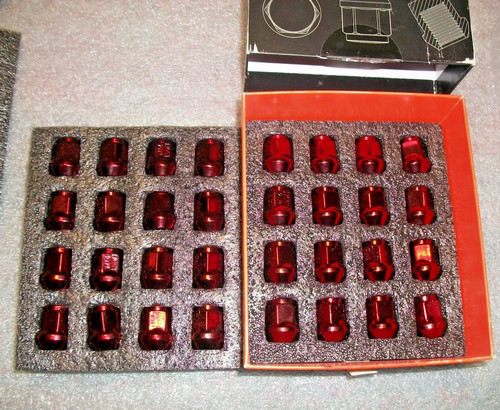 Red wheel lug nuts - wheel,