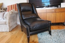 Designer Roche Bobois armchair in black leather