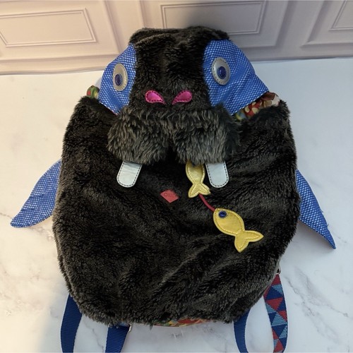 Rare oilily faux - rare, fur