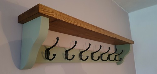 Wooden coat rack with - coat,